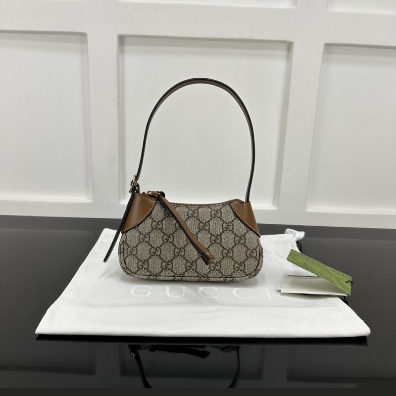 G*u*i top handle bags
